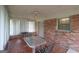 Enclosed sunroom with a ceiling fan and an eating area at 3257 Greenvale Way, Decatur, GA 30034