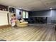 Basement living area offers a fireplace, accent wall, and cozy seating arrangement at 4710 Meadowlark Se Dr, Conyers, GA 30094