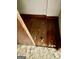 Damaged hardwood floor in a room with debris on it at 8395 Rivertown Rd, Fairburn, GA 30213