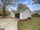 Exterior view of a two car garage at 7747 Roundtree Xing, Riverdale, GA 30274