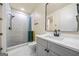 Updated bathroom with stylish gray vanity, walk-in shower, and modern fixtures at 140 Wesley Pl, Fayetteville, GA 30214