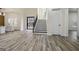 Bright foyer showcasing hardwood floors, a staircase with iron railings, and a stylish front door at 140 Wesley Pl, Fayetteville, GA 30214