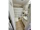 Cozy bathroom featuring a shower and vanity with a sink at 55 Long Dr, Covington, GA 30016