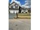 Charming two-story home featuring a two-car garage, well-maintained lawn, and inviting curb appeal at 55 Long Dr, Covington, GA 30016