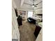 Spacious main bedroom featuring a tray ceiling, ceiling fan, and decorative accents at 55 Long Dr, Covington, GA 30016