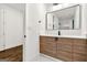 Modern bathroom with stylish vanity, framed mirror, and marble tiled floors at 130 Wesley Pl, Fayetteville, GA 30214