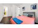 Cozy bedroom with hardwood floors, natural light, and access to an ensuite bathroom at 130 Wesley Pl, Fayetteville, GA 30214