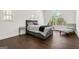 Bright bedroom with large windows, hardwood floors, and comfortable chair at 130 Wesley Pl, Fayetteville, GA 30214