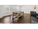 Entertainment area boasts a pool table and ample seating, perfect for gatherings at 130 Wesley Pl, Fayetteville, GA 30214
