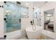 Stunning main bathroom with luxurious rainfall showers, and a modern soaking tub at 130 Wesley Pl, Fayetteville, GA 30214