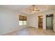 Bedroom featuring a ceiling fan, closet, and attached bathroom at 230 Hidden Brook Trl, Fayetteville, GA 30215