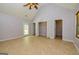 Spacious bedroom with vaulted ceiling, ceiling fan, and neutral colors at 230 Hidden Brook Trl, Fayetteville, GA 30215