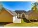 Backyard view of the home featuring a patio and green space at 230 Hidden Brook Trl, Fayetteville, GA 30215