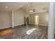 Large open living space features vaulted ceiling and dark hardwood floors at 230 Hidden Brook Trl, Fayetteville, GA 30215