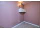 Small room with neutral colors and single storage cabinet at 230 Hidden Brook Trl, Fayetteville, GA 30215
