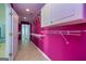 Spacious walk-in closet includes lots of shelving and extra storage at 230 Hidden Brook Trl, Fayetteville, GA 30215