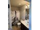 Charming bathroom with a vanity and a shower featuring an Eiffel Tower curtain at 110 Broadwater Dr, Fayetteville, GA 30214