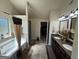 Bathroom with a soaking tub with a window view and a double sink vanity at 110 Broadwater Dr, Fayetteville, GA 30214