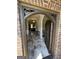 Grand foyer with marble floors and an ornate metal front door at 110 Broadwater Dr, Fayetteville, GA 30214