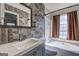 Bathroom featuring a tub, shower, toilet, and vanity with patterned wallpaper at 9689 Pintail Trl, Jonesboro, GA 30238