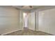 Neutral bedroom with carpet flooring and double door closet at 9689 Pintail Trl, Jonesboro, GA 30238