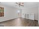 Bedroom featuring a ceiling fan, door to the exterior and a closet at 3540 Owl Brow Ct, Cumming, GA 30028