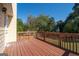 Wooden deck with wooden railings at 3540 Owl Brow Ct, Cumming, GA 30028