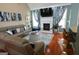 Spacious living room with vaulted ceilings, a cozy fireplace, and stylish decor at 480 Meadow Sage Ln, Fayetteville, GA 30214