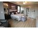 A serene main bedroom with a tray ceiling, plush bedding, and ample closet space at 480 Meadow Sage Ln, Fayetteville, GA 30214