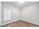 Bedroom features one window, neutral walls, and flooring at 4875 Ben Hill Rd, College Park, GA 30349