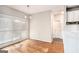 Cozy dining room with hardwood floors and natural light, adjacent to the kitchen at 4875 Ben Hill Rd, College Park, GA 30349