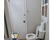 Compact bathroom with a standard toilet and quirky decor, suitable for a smaller space at 6501 River Run Rd, Riverdale, GA 30274
