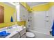 Bathroom featuring a single sink vanity and shower over tub at 655 Sunset Dr, Locust Grove, GA 30248