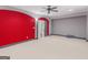Open basement area featuring neutral carpet, gray walls and recessed lighting at 5297 Heron Bay Blvd, Locust Grove, GA 30248