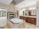 Luxurious bathroom with a jetted tub, and dual sink vanity offering plenty of counter space at 5297 Heron Bay Blvd, Locust Grove, GA 30248