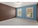 Comfortable bedroom with cozy carpet, natural light and neutral color palette at 5297 Heron Bay Blvd, Locust Grove, GA 30248