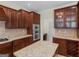 Custom kitchen with granite countertops, custom cabinets, and stainless appliances at 5297 Heron Bay Blvd, Locust Grove, GA 30248