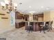 Gourmet kitchen features custom cabinets, granite countertops, and a large island at 5297 Heron Bay Blvd, Locust Grove, GA 30248
