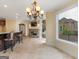 Spacious living room with fireplace and bar, perfect for entertaining guests at 5297 Heron Bay Blvd, Locust Grove, GA 30248