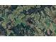 Aerial view of expansive property surrounded by farmland and woods at 3011 Broughton Rd at 3011 Broughton Rd, Newborn, GA 30056