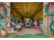 Interior showcasing the open layout and wooden beams, creating versatile space for storage or projects at 3011 Broughton Rd, Newborn, GA 30056