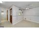 Eat-in kitchen with charming wallpaper and a door leading to additional spaces at 2572 Creston Way, Morrow, GA 30260