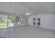 Bright sunroom with white ceiling, tile floors, a ceiling fan and access to the outdoors at 2572 Creston Way, Morrow, GA 30260