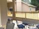 Back deck featuring an outdoor dining area at 6279 Giles Rd, Lithonia, GA 30058
