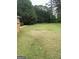 This backyard offers plenty of space for outdoor activities and recreation at 6279 Giles Rd, Lithonia, GA 30058