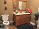 Well-lit bathroom with vanity, mirror, and modern fixtures at 6279 Giles Rd, Lithonia, GA 30058