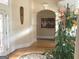 Elegant foyer with hardwood floors, arched doorway, and stylish decor at 6279 Giles Rd, Lithonia, GA 30058