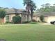 Lush front yard with mature landscaping and a well-kept lawn at 6279 Giles Rd, Lithonia, GA 30058