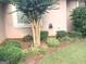 Neatly arranged landscaping with trimmed bushes and decorative mulch at 6279 Giles Rd, Lithonia, GA 30058
