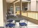 Inviting patio with a porch swing and a dining set, perfect for enjoying outdoor gatherings at 6279 Giles Rd, Lithonia, GA 30058